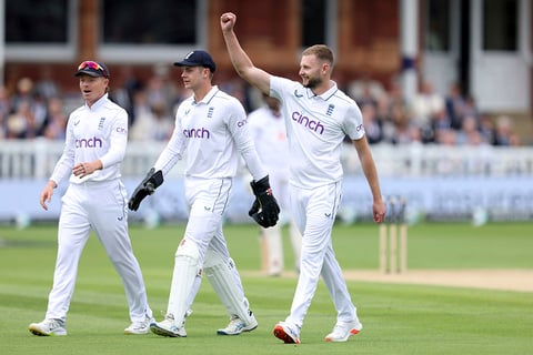 Gus Atkinson celebrates the wicket of Alzarri Joseph